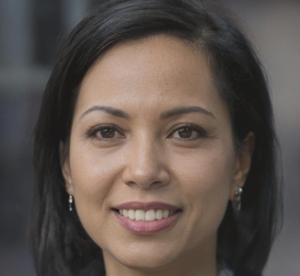 Professional headshot of testimonial author